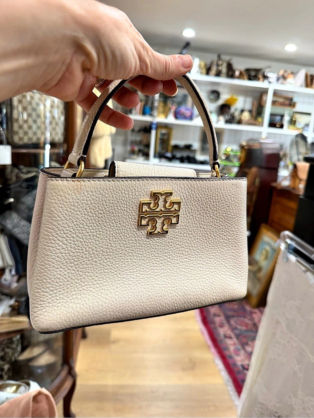 Tory Burch Britten Micro Top Handle Satchel in a cream color